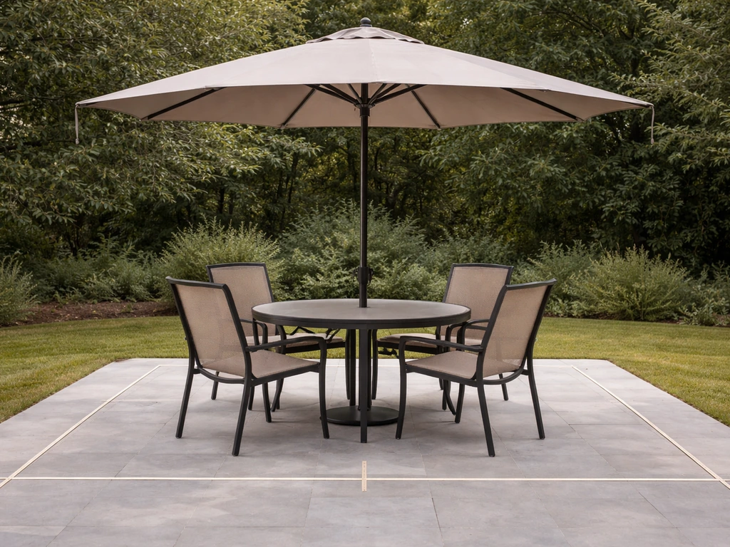 Minimal backyard dining setup showing a 15-ft umbrella canopy overhanging a table and seating width